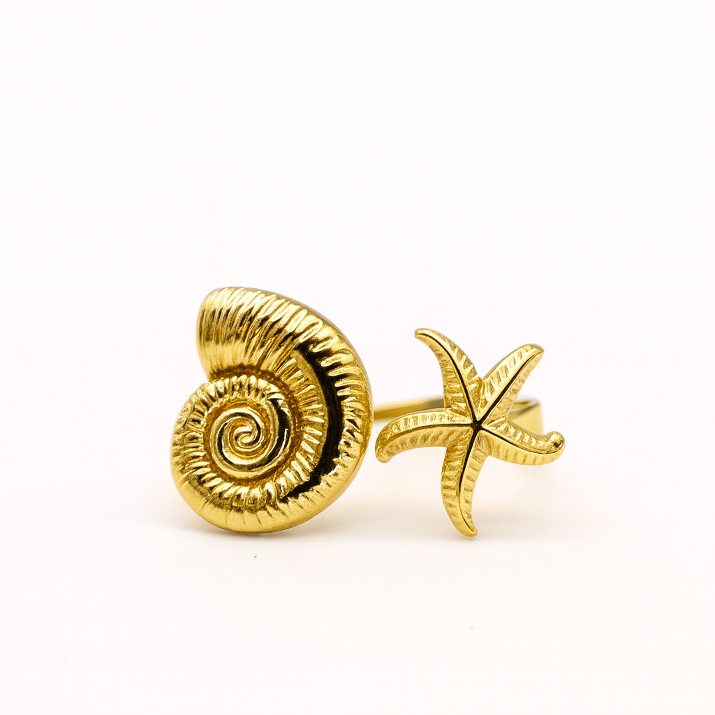 Anillo estrella y concha