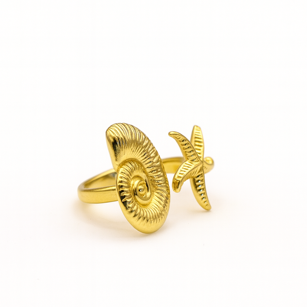 Anillo estrella y concha