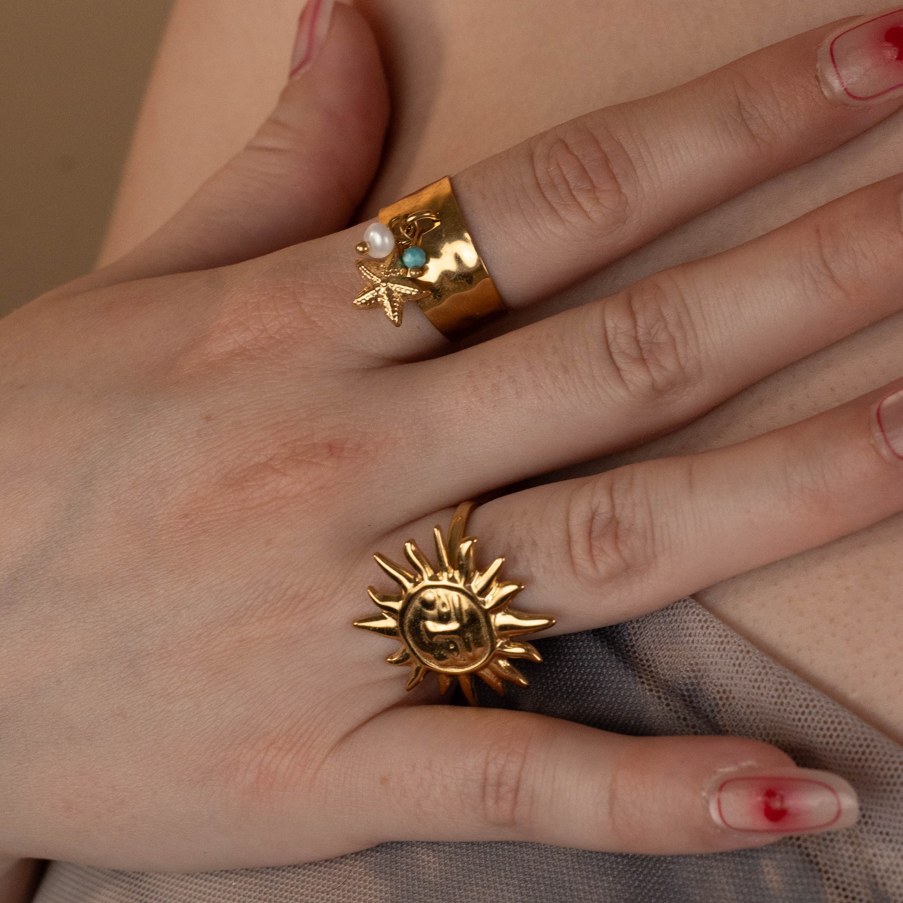 Anillo estrellita colgante