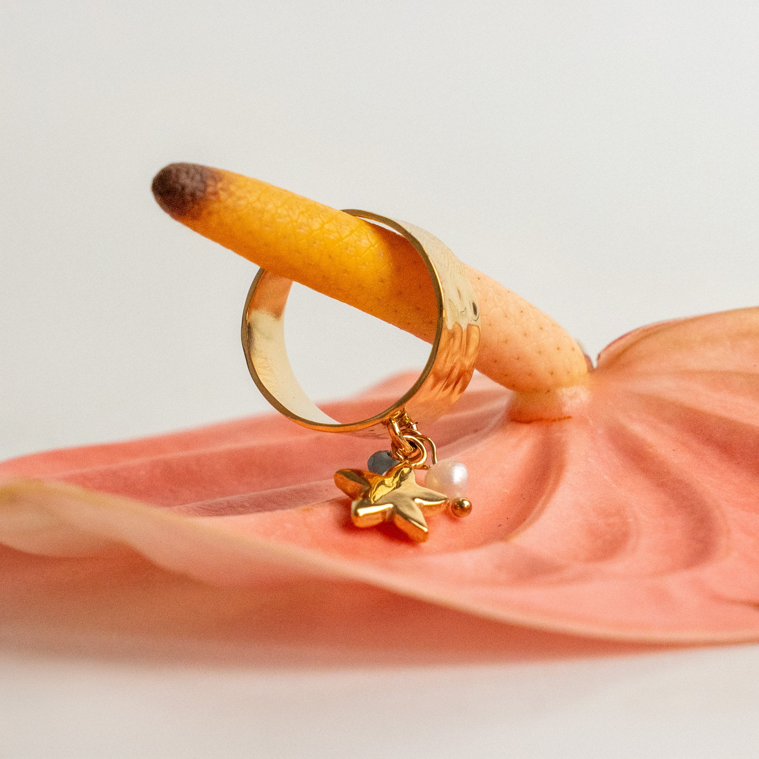 Anillo estrellita colgante